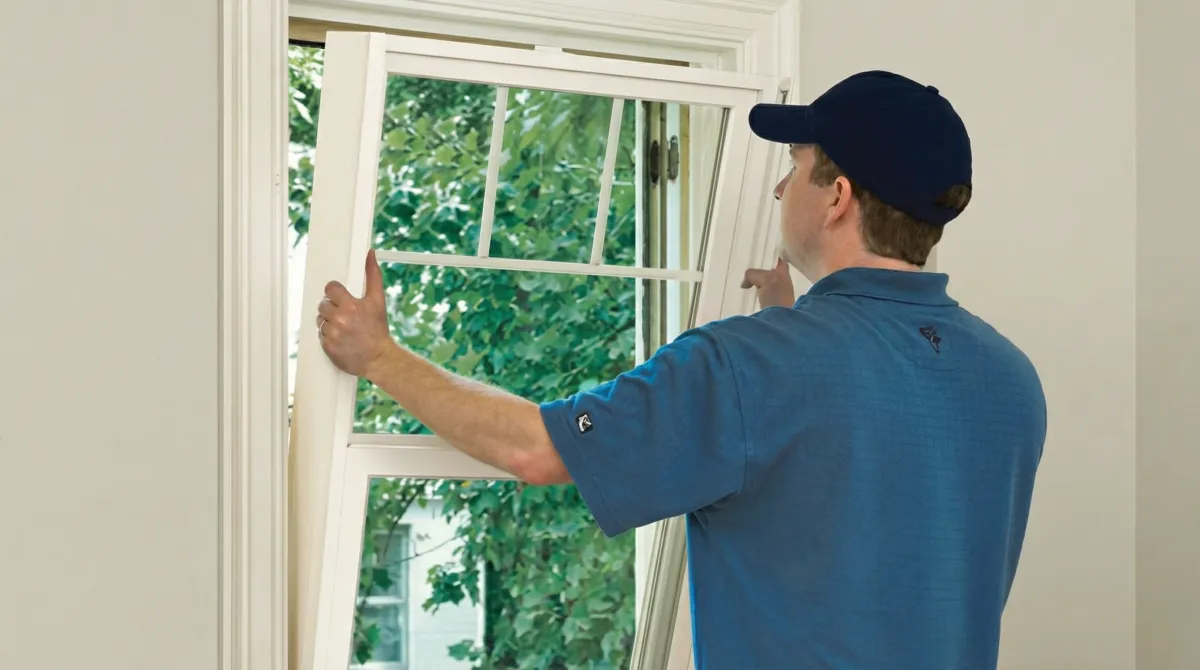 Professional contractors performing a residential window insulation and replacement service in Lakeland, FL